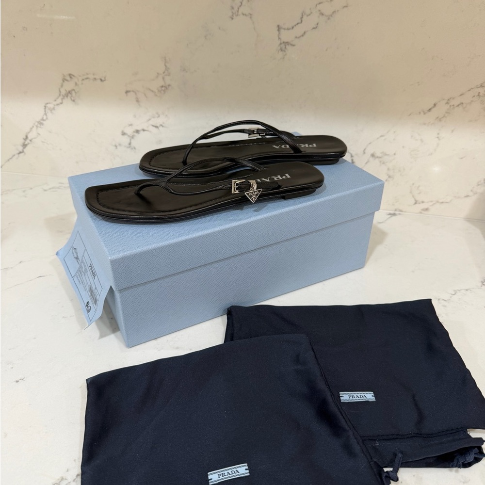Prada Black Thong Sandals with Silver Logo Charm
